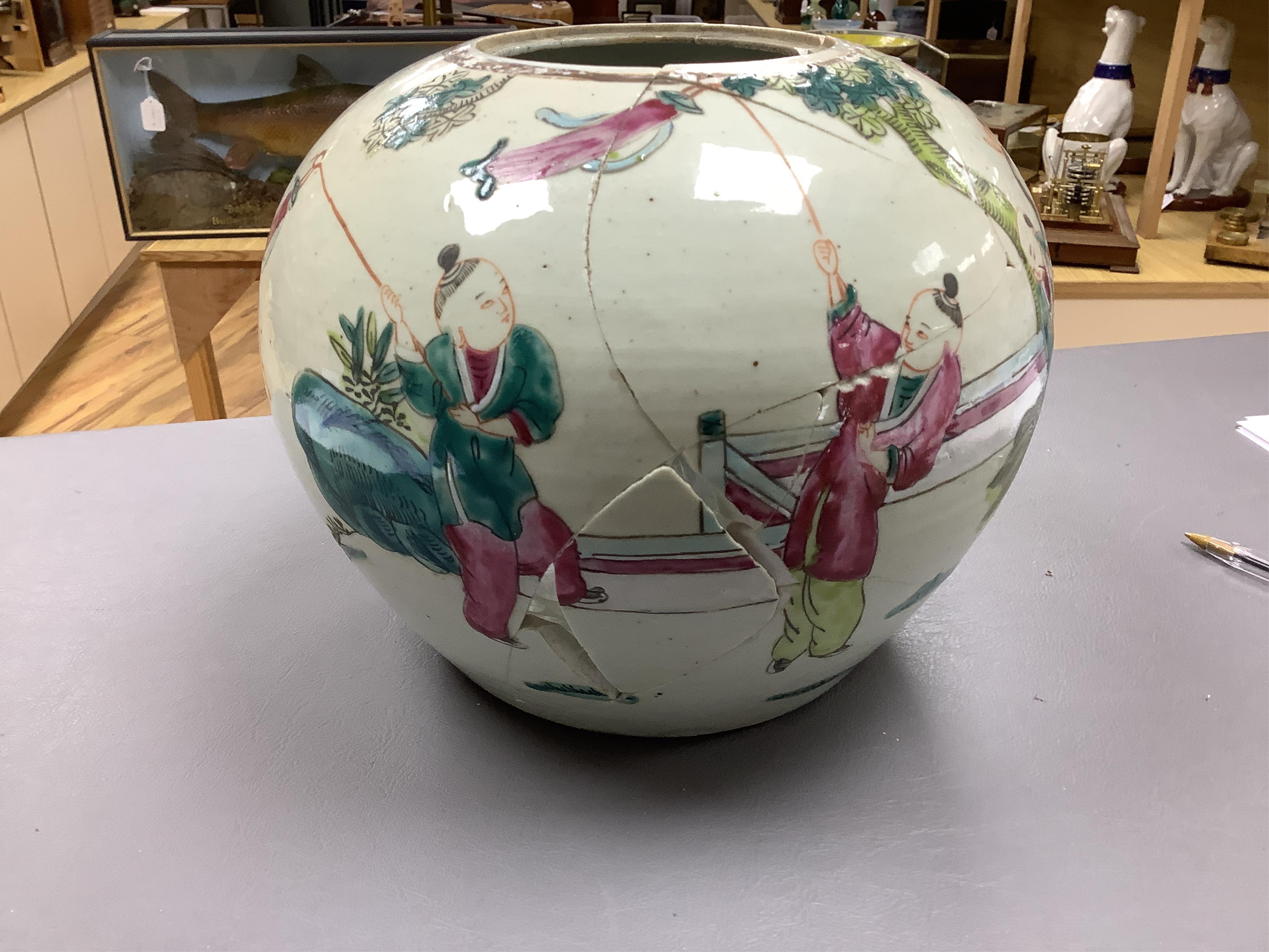 A pair of late 19th century Chinese famille rose jars, without covers, 19cm high.